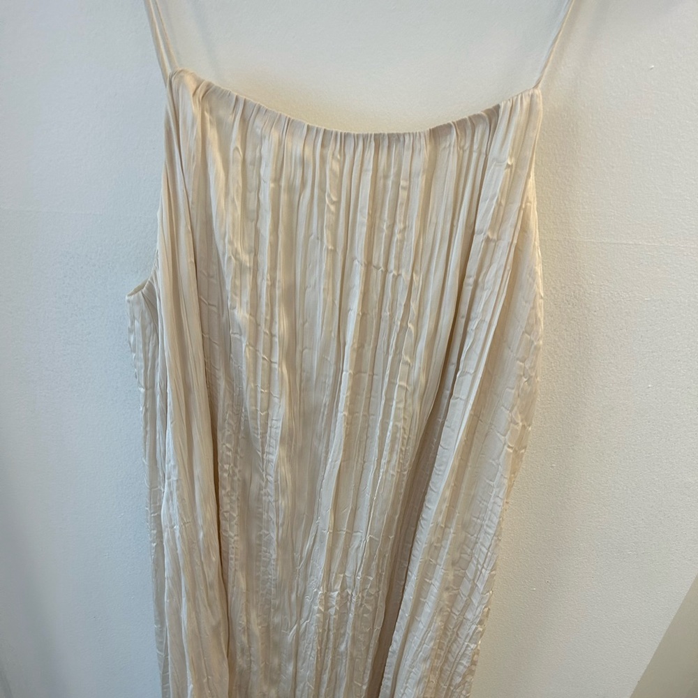 All row cream colored maxi silk dress
